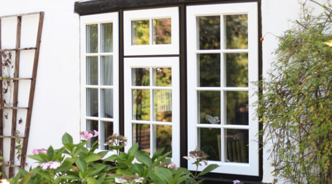 Black & white Tudor style Evolution Storm 2 lipped casement windows, Datchet, Berkshire