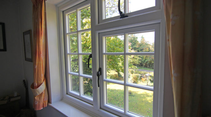 Black & white Tudor style Evolution Storm 2 lipped casement windows, Datchet, Berkshire