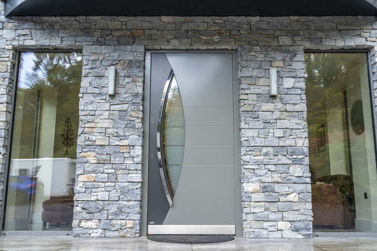 Contemporary aluminium entrance door with premium security features