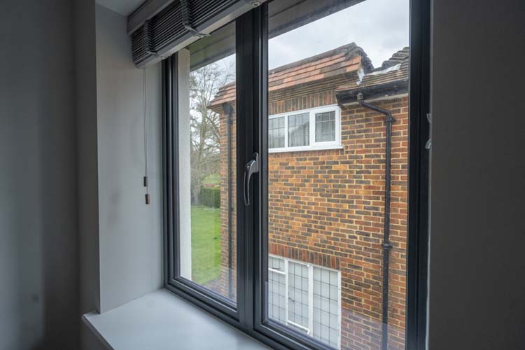 Close-up of high-quality flush casement window frame and hardwar