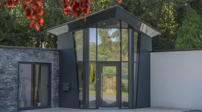 Aluminium Curtain Walling creates a Contemporary Glazed Entrance for a 1960 Bungalow Renovation in Crowthorne.