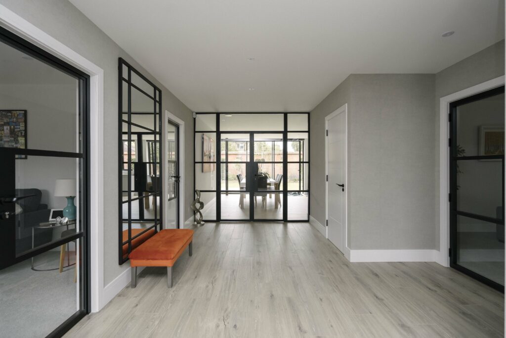 Minimalist home design featuring black aluminium glazing