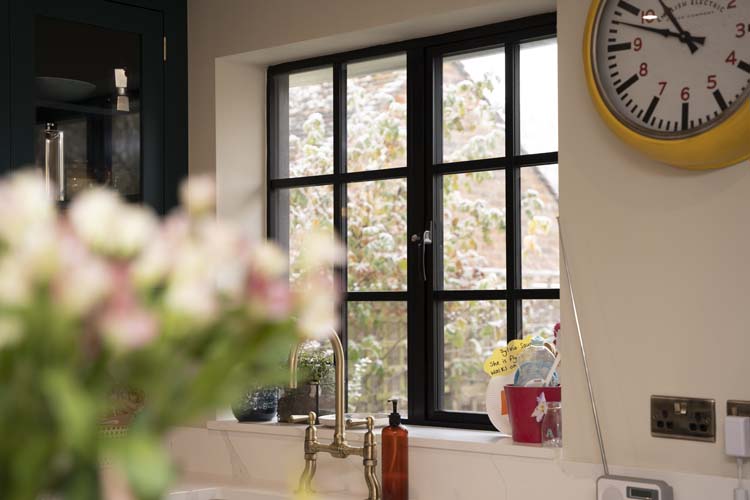 Industrial-style black steel-look windows in modern interior