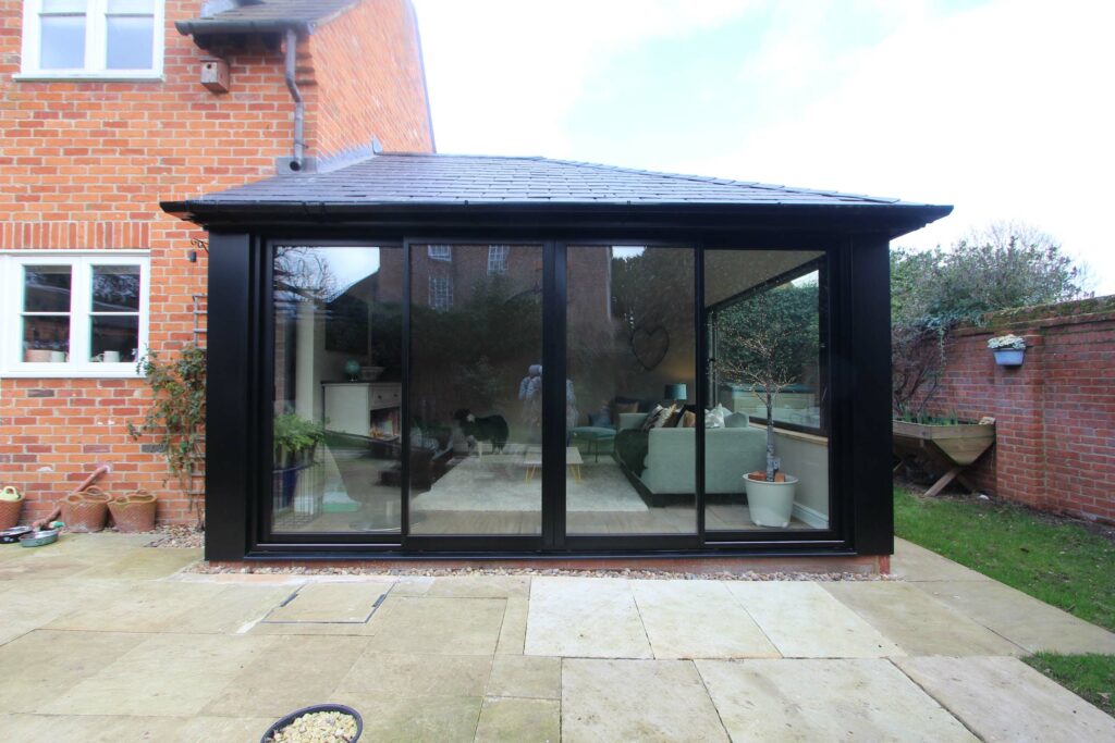 Modern conservatory roofs including glass and solid roof options