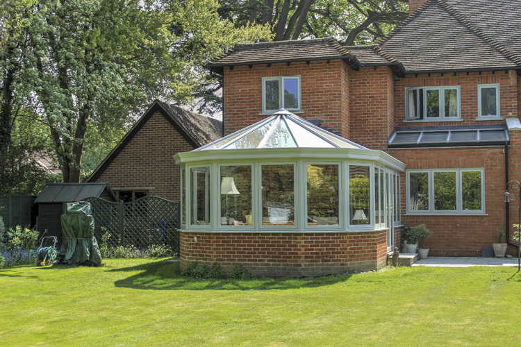 Edwardian conservatory with rectangular shape and pitched roof maximising floor space