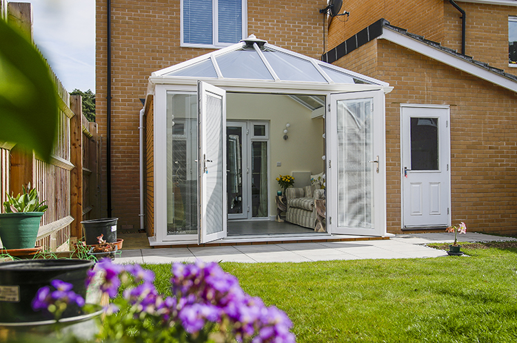 Contemporary glass conservatory extension increasing home value and space