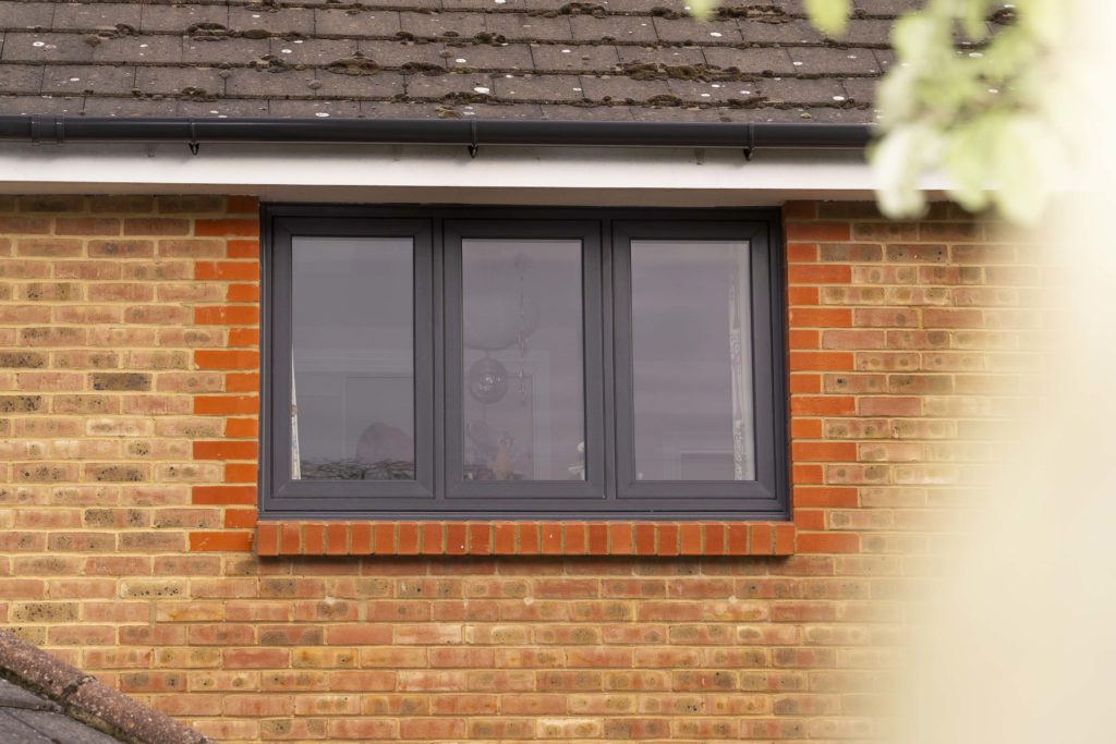Anthracite grey aluminium flush casement windows with slim sightlines
