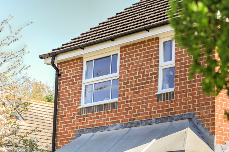 White uPVC replacement windows with energy-efficient double glazing
