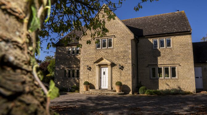 Pebble Grey Heritage Windows Enhance Stone Mullions in Country Home, Hungerford.