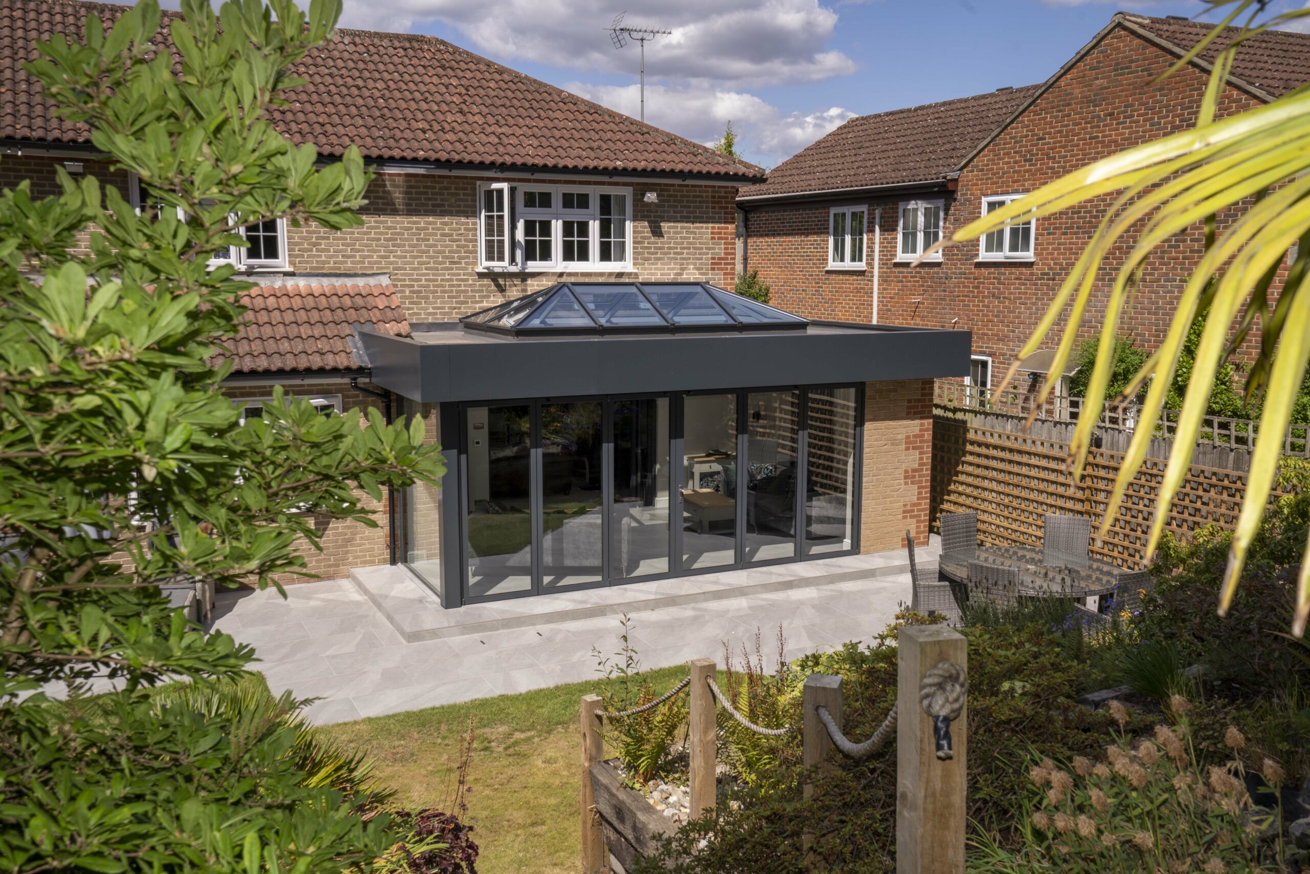 Polycarbonate Roof Conservatory replaced with Modern Glass Room Extension, Lightwater.