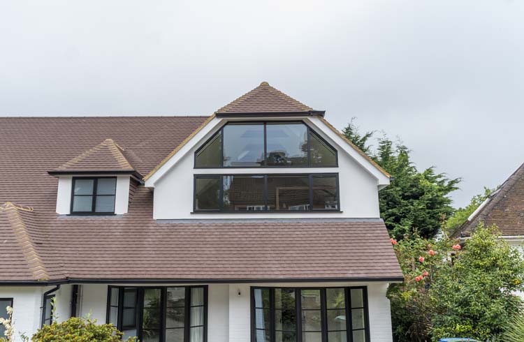 Black windows enhancing kerb appeal on renovated property