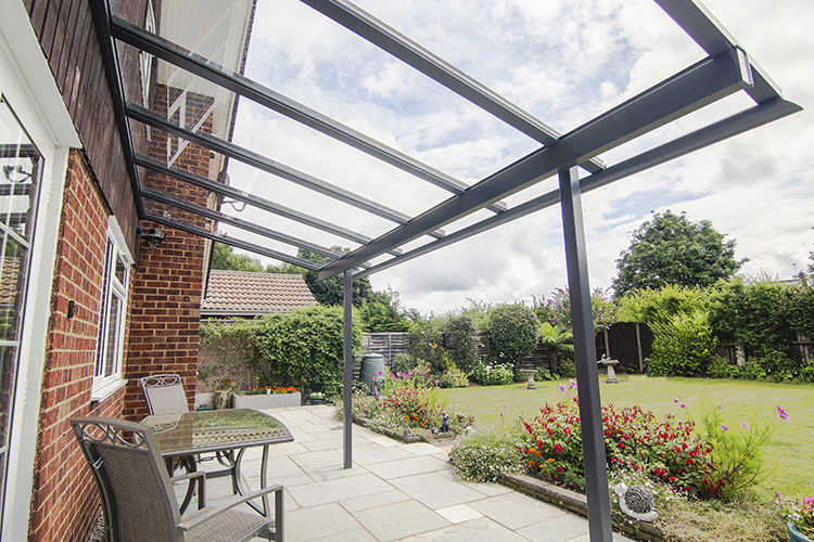 Natural light streaming through a glass roof atrium