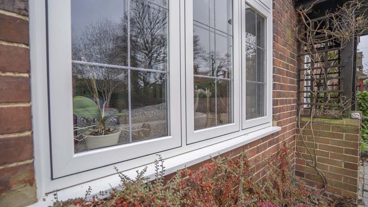 Close-up of high-quality flush casement window frame and hardware